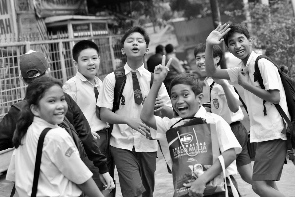 A group of students react to the camera — photograph by Peter Pickering